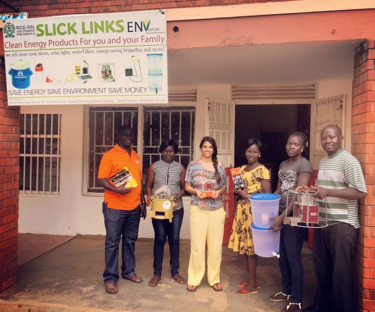 enventure-team-visiting-rice-team-at-their-internet-cafe-and-clean-energy-business-liberia-and-esther-are-second-and-third-from-the-right